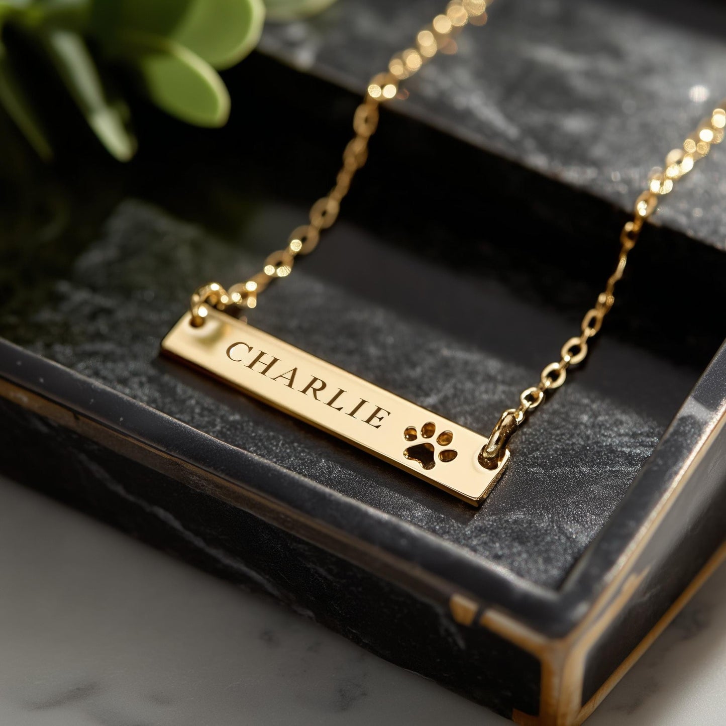 Personalized gold bar necklace with engraved name and cutout paw print – custom pet memorial jewelry, dog lover gift, minimalist keepsake necklace.