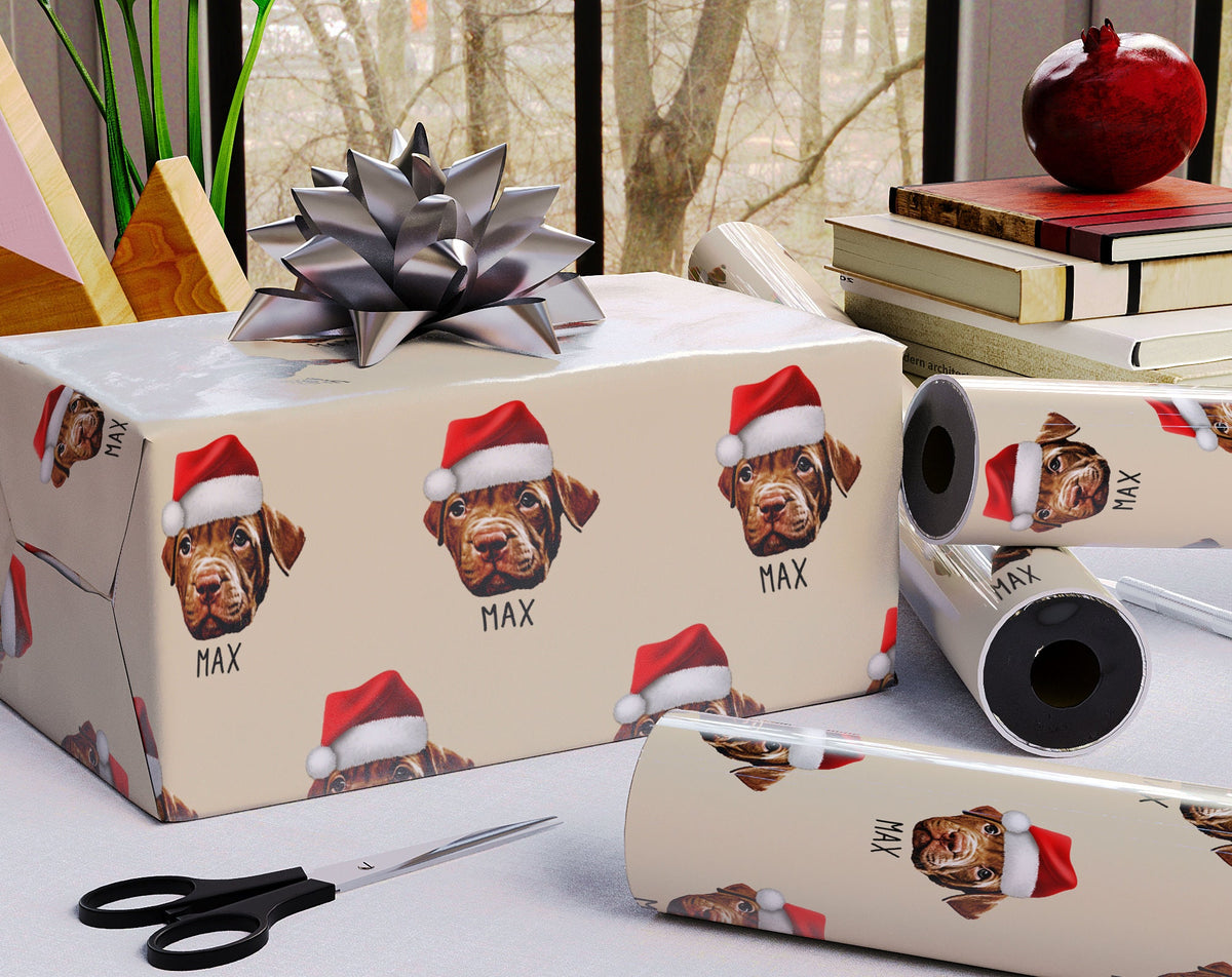 Custom dog Christmas wrapping paper with pet photo and name – festive holiday gift wrap featuring dogs in Santa hats. Personalized glossy gift wrap rolls, perfect for pet lovers’ Christmas presents.