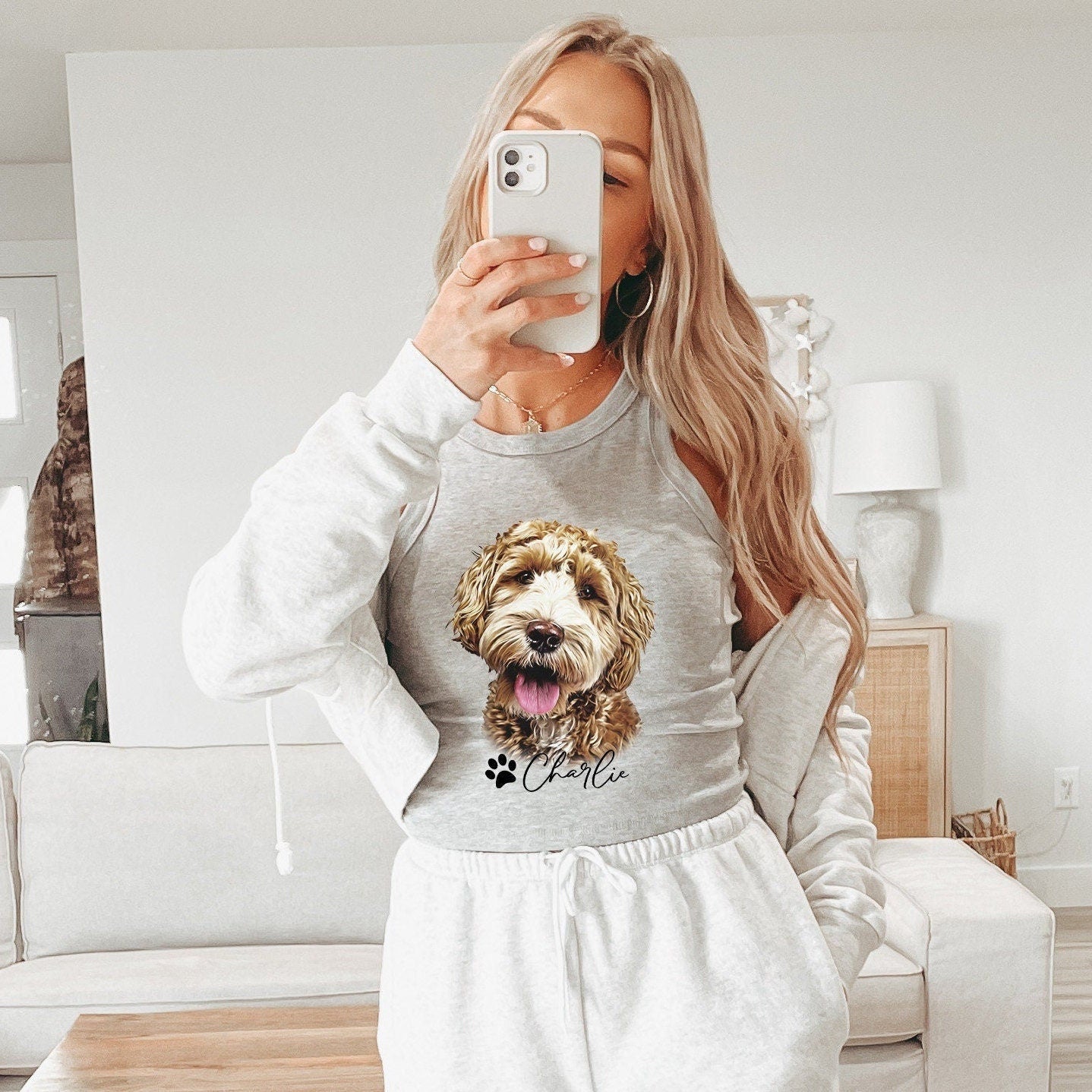 Gray racerback tank top featuring a custom portrait of a doodle dog with the name 'Charlie' and a paw print design. Styled casually with a matching loungewear set, perfect for dog moms or pet lovers as a personalized gift or comfy everyday wear.