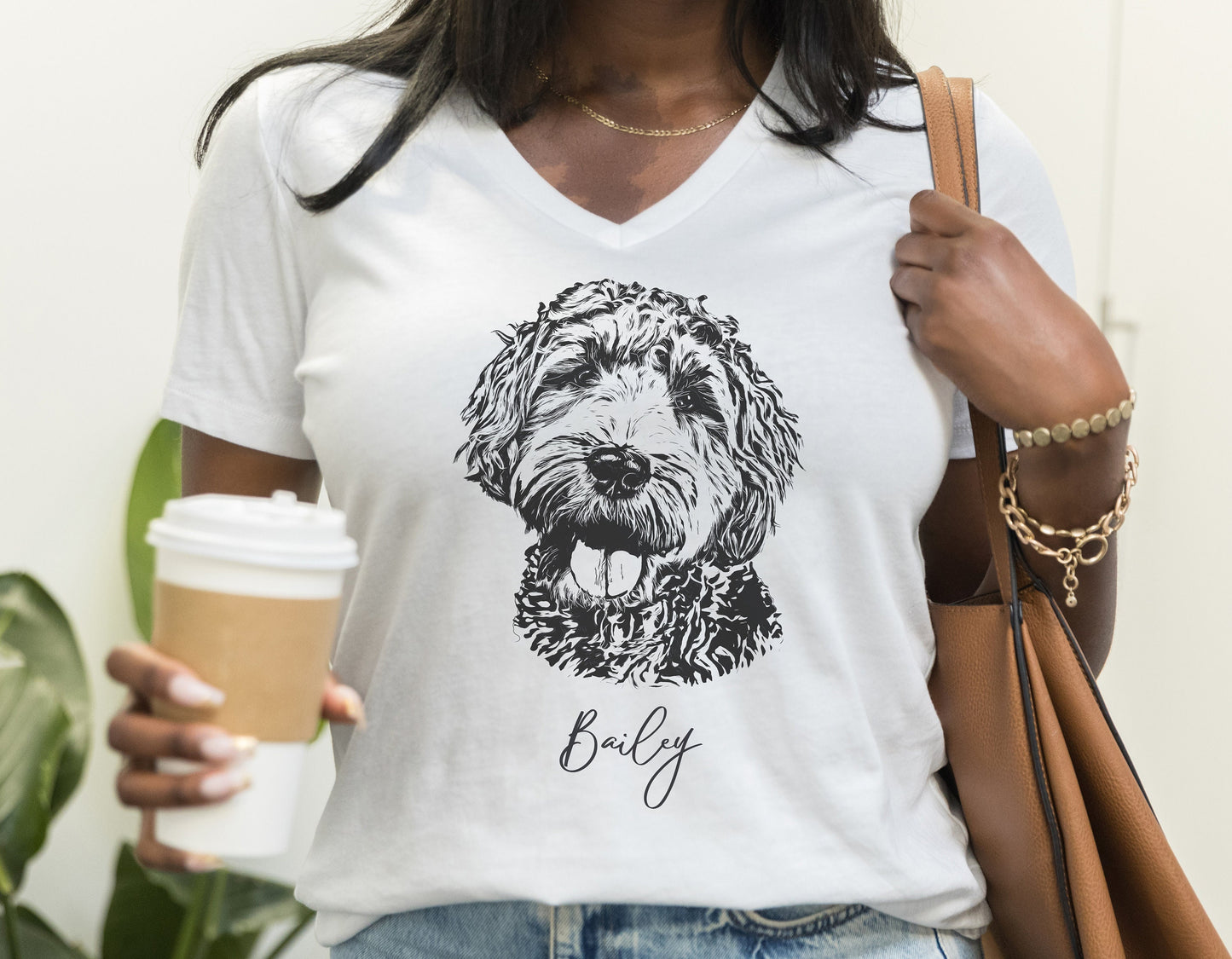 Custom-made V-neck t-shirt featuring a detailed pet portrait of 'Bailey' with elegant script. Perfect for pet lovers to showcase their furry friend in style. Comfortable, unique, and a thoughtful gift for any occasion!