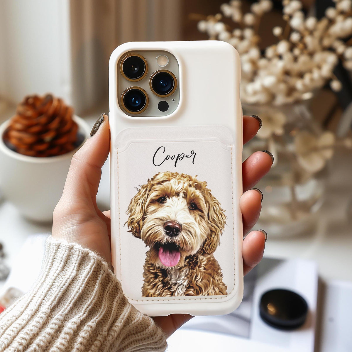 Custom iPhone magsafe compatible wallet case with realistic pet portrait and name ‘Cooper,’ held in hand — personalized MagSafe-compatible vegan leather phone case.