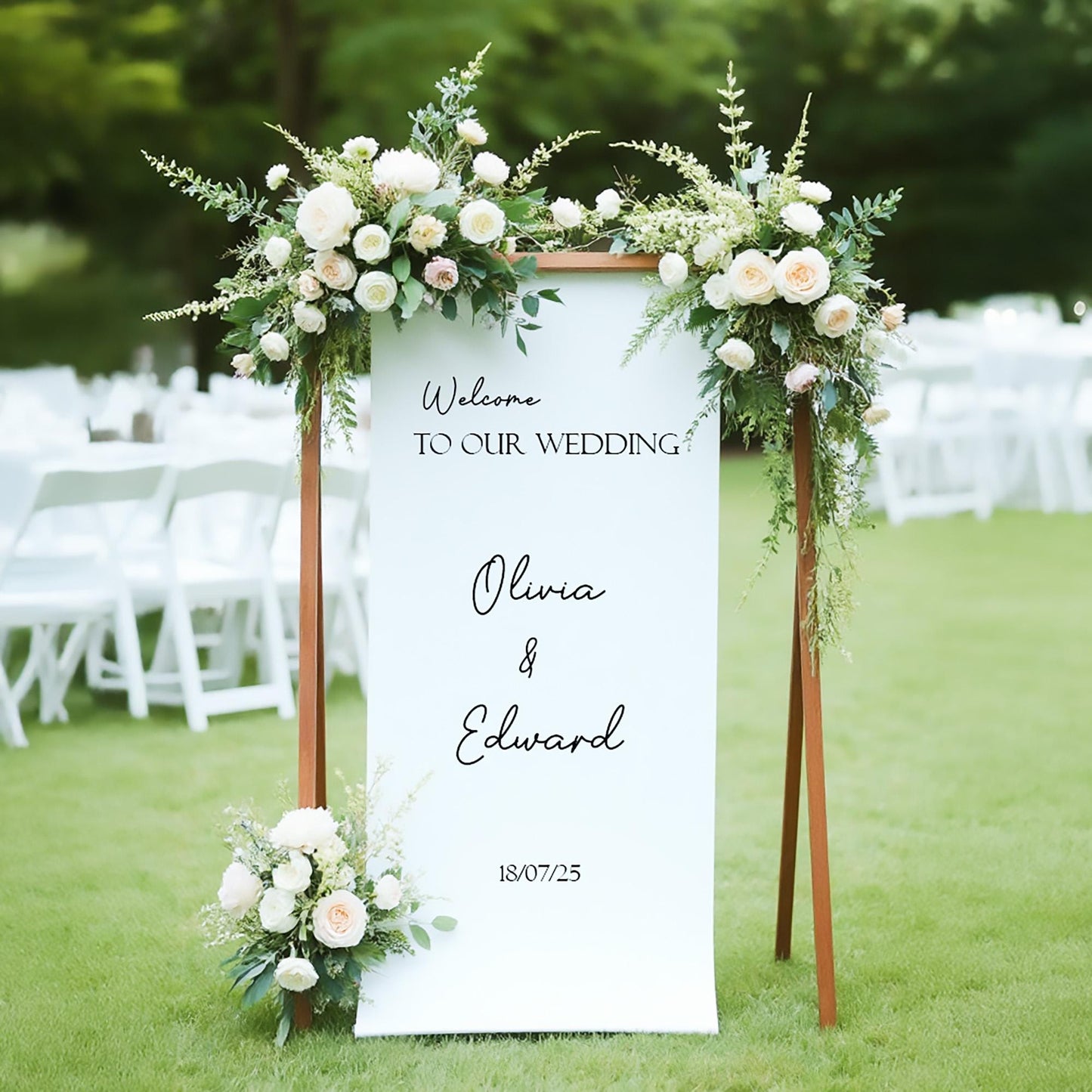 Elegant outdoor wedding welcome sign with white and blush floral arrangements, rustic wooden frame, personalized with names Olivia and Edward and wedding date 18/07/25, perfect for garden or outdoor wedding décor.